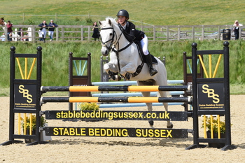 Robyn Woodward wins the Blue Chip Pony Newcomers Second Round at Pyecombe Horse Show